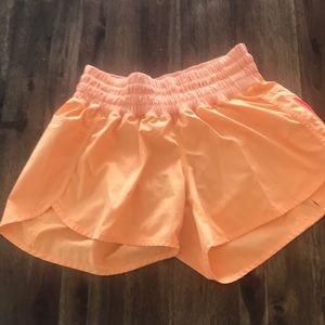 Lululemon tracker shorts - bright orange size 8